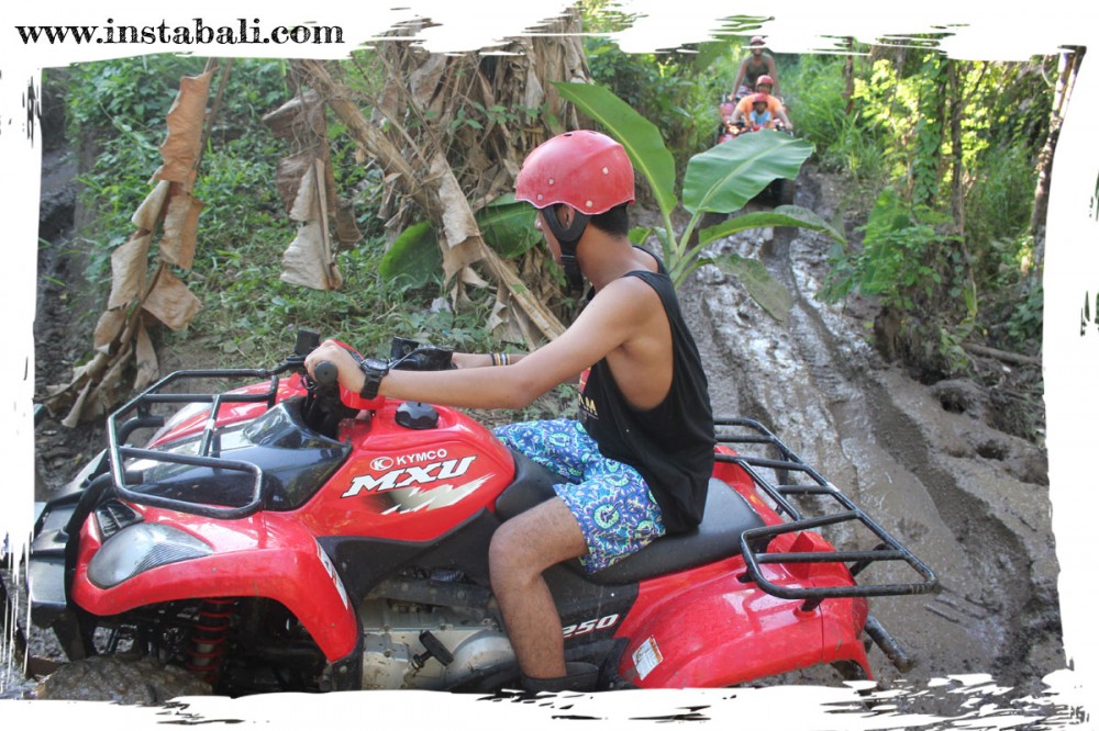 Quad Bike on a Muddy Track
